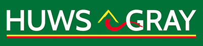 Logo with "HUWS GRAY" in white capital letters on a green background. A yellow and red design between the words resembles a roof and path—reflecting expertise in home extensions. A thin yellow and red stripe runs along the bottom.